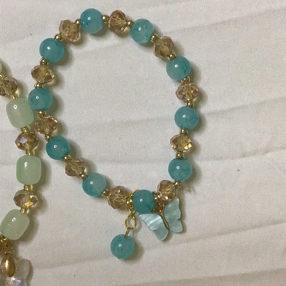 Green and Blue Beaded Bracelets with Nature-Inspired Charms - Picture 2 of 4